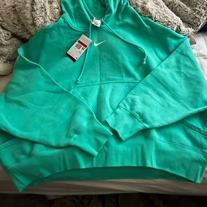 Women’s  Nike hoodie teal green I would say brand new
